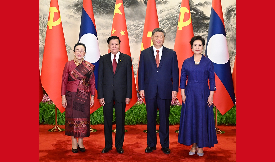 习近平同老挝人民革命党中央总书记、国家主席通伦举行会谈