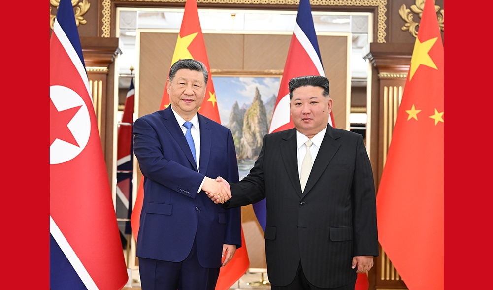 习近平同金正恩举行会谈